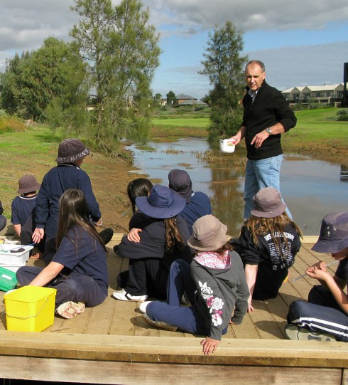 Baz teaching creek studies on the bridge